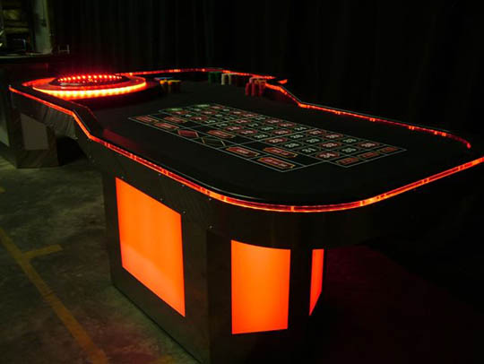 Red Lighted Roulette Table for Casino Parties